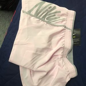 Nike Women’s Dri Fit Running Shorts- pink